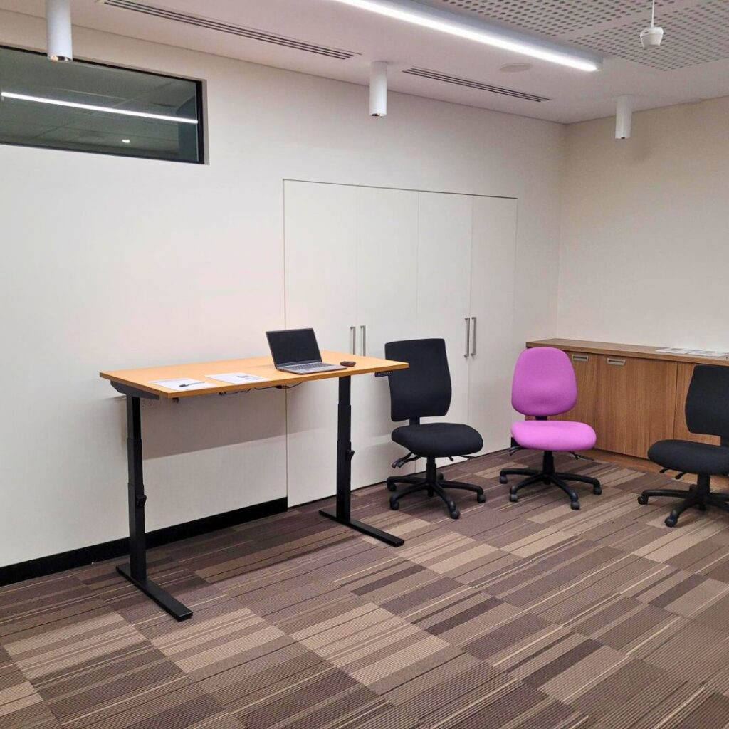 A Gregory ergonomic chair set up in a modern office environment, highlighting its sleek design and comfort